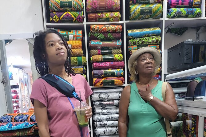 African custom clothing making experience with fabric tour - Choosing between a dress, shirt, and caftan
