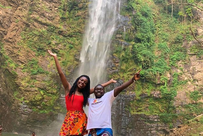 Discover Ghana - Wli Waterfalls, Mountain Afadjato, Monkey Sanctuary & Akosombo. - Swimming under the two cascades at Wli Waterfalls