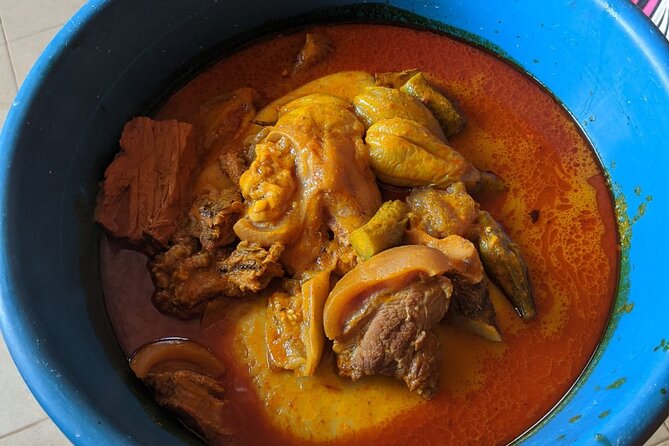 Local Ghanaian Cooking Class in Accra to help support wellness community center - Cooking with Gifty, Auntie Irene, and local families